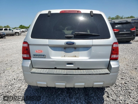 2011 Ford Escape XLS с VIN 1FMCU0C77BKB53875, выставлен на аукционе Copart как лот 53185705 с пробегом 222 070 миль миль и Списание • Salvage title. История ставок и продаж доступна на DreamBid. Изображение 6.