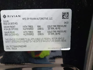 2023 Rivian R1T Adventure with VIN 7FCTGAAA2PN023485, listed as a IAAI auction lot 41227330 with 1 mi miles. Bid and sale history available at carsss.com. Image 9.
