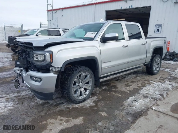2018 GMC Sierra 1500 Denali with VIN 3GTU2PEJXJG472435, listed as a IAAI auction lot 41376821 with 63,177 mi miles. Bid and sale history available at carsss.com. Image 2.