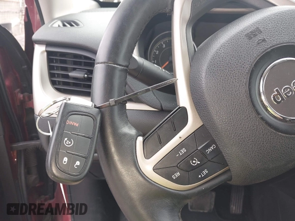 2015 Jeep Cherokee Limited with VIN 1C4PJMDSXFW604627, listed as a IAAI auction lot 42072953 with 102,501 mi miles and . Bid and sale history available at DreamBid. Image 11.