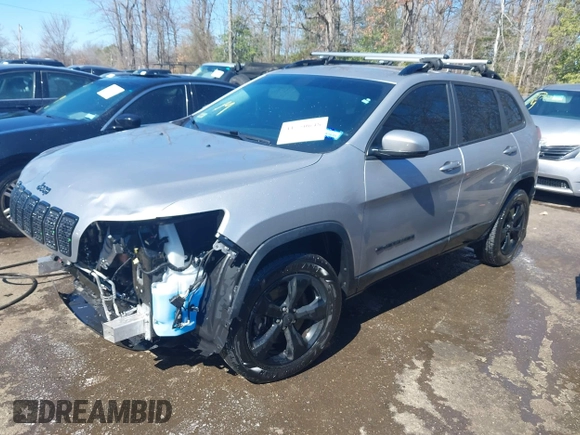2020 Jeep Cherokee Altitude with VIN 1C4PJMLN6LD541335, listed as a IAAI auction lot 41750648 with 66,880 mi miles. Bid and sale history available at carsss.com. Image 2.