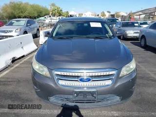 2011 Ford Taurus SEL with VIN 1FAHP2EW9BG158991, listed as a IAAI auction lot 41530132 with 153,323 mi miles. Bid and sale history available at carsss.com. Image 15.