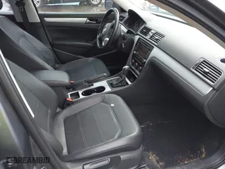 2013 Volkswagen Passat SE w/Sunroof with VIN 1VWBH7A38DC002096, listed as a IAAI auction lot 41904594 with 134,738 mi miles. Bid and sale history available at carsss.com. Image 5.