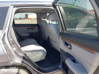 2019 Honda CR-V EX with VIN 5J6RW1H58KA042502, listed as a IAAI auction lot 42001700 with 117,396 mi miles and . Bid and sale history available at DreamBid. Image 8.