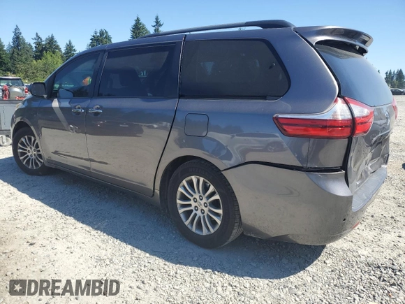 2015 Toyota Sienna XLE with VIN 5TDYK3DC7FS630252, listed as a Copart auction lot 65182965 with 90,764 mi miles and Salvage title. Bid and sale history available at DreamBid. Image 2.