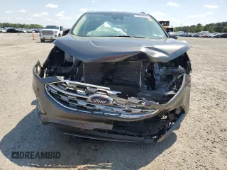 2020 Ford Edge SEL с VIN 2FMPK4J93LBB60742, выставлен на аукционе Copart как лот 52604255 с пробегом 37 659 миль миль и Списание • Salvage title. История ставок и продаж доступна на DreamBid. Изображение 5.