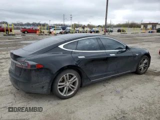2013 Tesla Model S with VIN 5YJSA1AC4DFP10725, listed as a Copart auction lot 50955945 with 125,512 mi miles and Salvage Title. Bid and sale history available at carsss.com. Image 3.