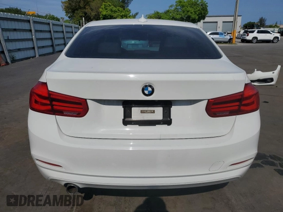 2018 BMW 3 Series 320i xDrive with VIN WBA8A3C55JA357532, listed as a Copart auction lot 57561015 with 46,876 mi miles and Salvage title. Bid and sale history available at DreamBid. Image 6.