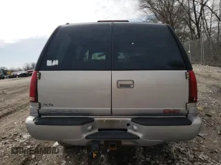 1999 GMC Denali with VIN 1GKEK13R0XR915053, listed as a Copart auction lot 49241145 with 2,664,121 mi miles and Salvage Title. Bid and sale history available at carsss.com. Image 6.