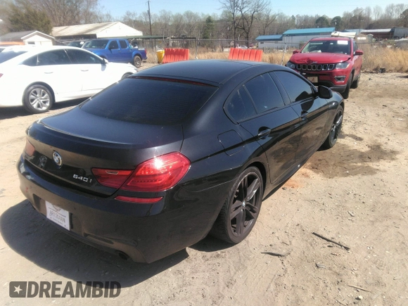 2014 BMW 6 Series 640i z VIN WBA6A0C57EDZ04682, wystawiony jako IAAI lot #41891362 z przebiegiem 140 478 mil mil oraz . Historia ofert i sprzedaży dostępna na DreamBid. Obrazek 4.