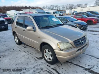 2001 Mercedes-Benz M-Class with VIN 4JGAB54E91A271230, listed as a IAAI auction lot 41519970 with 229,773 mi miles. Bid and sale history available at carsss.com. Image 1.