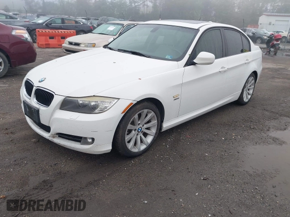 2011 BMW 3 Series 328i xDrive with VIN WBAPK5C56BA662236, listed as a IAAI auction lot 42207015 with 184,118 mi miles and . Bid and sale history available at DreamBid. Image 2.