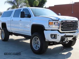 2015 GMC Sierra 2500HD Denali with VIN 1GT120E80FF175769, listed as a Copart auction lot 63915115 with 116,447 mi miles and Salvage title. Bid and sale history available at DreamBid. Image 1.