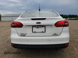 2016 Ford Focus SE z VIN 1FADP3F29GL358431, wystawiony jako Copart lot #63378655 z przebiegiem 152 115 mil mil oraz Szkoda całkowita • Salvage title. Historia ofert i sprzedaży dostępna na DreamBid. Obrazek 6.