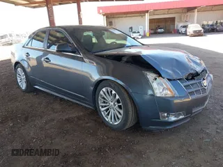 2010 Cadillac CTS with VIN 1G6DK5EG0A0141007, listed as a IAAI auction lot 41841972 with 142,898 mi miles and . Bid and sale history available at DreamBid. Image 1.