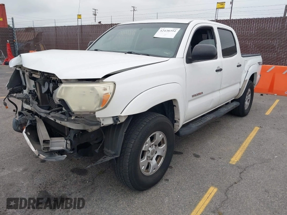 2014 Toyota Tacoma PreRunner z VIN 3TMJU4GN3EM170360, wystawiony jako IAAI lot #42438394 z przebiegiem 223 101 mil mil oraz . Historia ofert i sprzedaży dostępna na DreamBid. Obrazek 2.