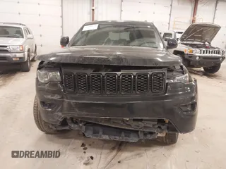 2018 Jeep Grand Cherokee Laredo E with VIN 1C4RJFAG5JC417701, listed as a IAAI auction lot 42001159 with 110,767 mi miles and . Bid and sale history available at DreamBid. Image 6.