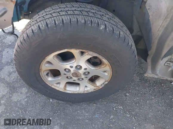1999 Jeep Grand Cherokee Laredo with VIN 1J4GW58NXXC623753, listed as a IAAI auction lot 41685540 with 190,134 mi miles and . Bid and sale history available at DreamBid. Image 12.