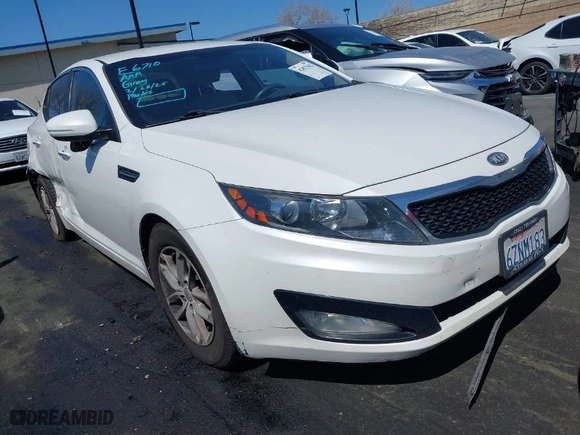 2013 Kia Optima LX with VIN KNAGM4A71D5383314, listed as a IAAI auction lot 41812942 with 228,220 mi miles. Bid and sale history available at carsss.com. Image 1.