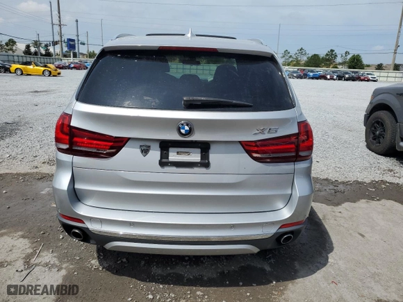 2017 BMW X5 sDrive35i with VIN 5UXKR2C51H0U19521, listed as a Copart auction lot 50580615 with 0 mi miles and Salvage Title. Bid and sale history available at carsss.com. Image 6.