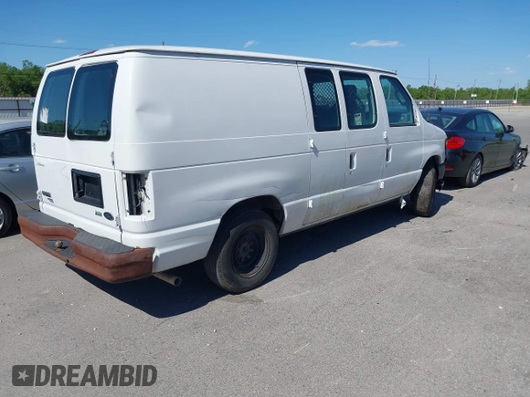 2011 Ford Econoline Cargo Commercial with VIN 1FTNE1EW6BDA44784, listed as a IAAI auction lot 42028659 with 141,661 mi miles and . Bid and sale history available at carsss.com. Image 4.