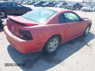 2000 Ford Mustang with VIN 1FAFP4047YF304313, listed as a IAAI auction lot 42397594 with 139,016 mi miles and . Bid and sale history available at DreamBid. Image 4.