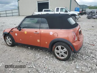 2006 MINI Convertible with VIN WMWRF335X6TG15824, listed as a Copart auction lot 56163205 with 113,109 mi miles and Salvage title. Bid and sale history available at DreamBid. Image 2.