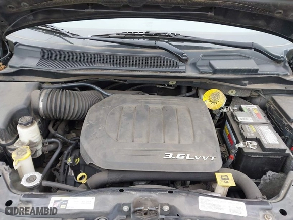 2014 Dodge Grand Caravan SE with VIN 2C4RDGBG8ER379647, listed as a IAAI auction lot 41779564 with 79,852 mi miles. Bid and sale history available at carsss.com. Image 10.