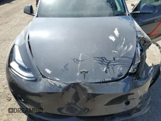 2024 Tesla Model Y Long Range z VIN 7SAYGDEE9RA255805, wystawiony jako Copart lot #50836555 z przebiegiem Nie podano mil oraz Szkoda całkowita • Salvage title. Historia ofert i sprzedaży dostępna na DreamBid. Obrazek 11.