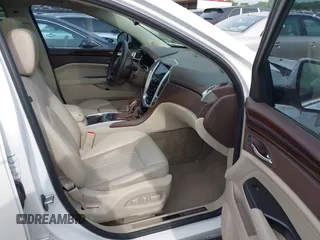 2013 Cadillac SRX Premium Collection with VIN 3GYFNEE36DS508381, listed as a IAAI auction lot 42164119 with 85,810 mi miles and . Bid and sale history available at DreamBid. Image 5.