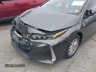 2018 Toyota Prius Plus with VIN JTDKARFPXJ3087064, listed as a IAAI auction lot 41433495 with 118,298 mi miles and . Bid and sale history available at DreamBid. Image 6.