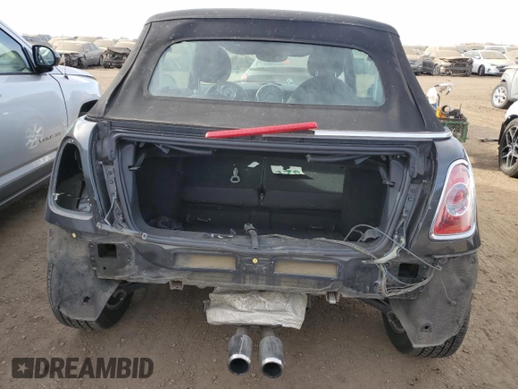 2011 MINI Convertible S z VIN WMWZP3C52BTX83901, wystawiony jako Copart lot #84217174 z przebiegiem 82 831 mil mil oraz Szkoda całkowita • Salvage title. Historia ofert i sprzedaży dostępna na DreamBid. Obrazek 6.