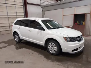 2015 Dodge Journey American Value z VIN 3C4PDCAB4FT714200, wystawiony jako IAAI lot #42199910 z przebiegiem 205 009 mil mil oraz . Historia ofert i sprzedaży dostępna na DreamBid. Obrazek 1.
