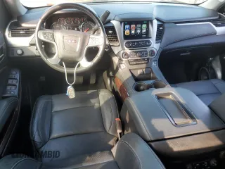 2019 GMC Yukon SLT with VIN 1GKS1BKC0KR387936, listed as a Copart auction lot 77191904 with 60,514 mi miles and Salvage Title. Bid and sale history available at carsss.com. Image 8.