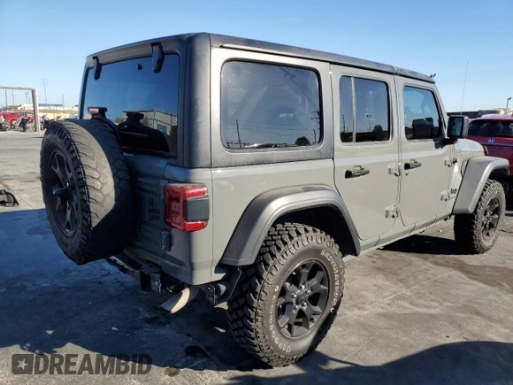 2020 Jeep Wrangler Unlimited Willys with VIN 1C4HJXDG5LW348507, listed as a Copart auction lot 77000574 with 57,056 mi miles and Salvage title. Bid and sale history available at DreamBid. Image 3.