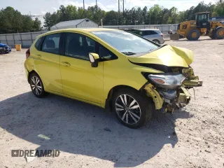2015 Honda Fit EX with VIN 3HGGK5G88FM725581, listed as a Copart auction lot 55156905 with 63,680 mi miles and Salvage title. Bid and sale history available at DreamBid. Image 4.