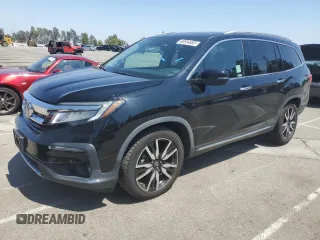 2019 Honda Pilot Touring 8-Passenger z VIN 5FNYF5H93KB019907, wystawiony jako Copart lot #60554655 z przebiegiem 52 089 mil mil oraz Szkoda całkowita • Salvage title. Historia ofert i sprzedaży dostępna na DreamBid. Obrazek 1.