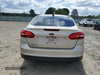 2018 Ford Focus SE z VIN 1FADP3F27JL226890, wystawiony jako Copart lot #56505085 z przebiegiem 112 865 mil mil oraz Szkoda całkowita • Salvage title. Historia ofert i sprzedaży dostępna na DreamBid. Obrazek 6.