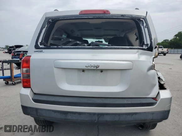2011 Jeep Patriot Sport with VIN 1J4NT1GBXBD146292, listed as a Copart auction lot 56982555 with 241,524 mi miles and Salvage title. Bid and sale history available at DreamBid. Image 6.