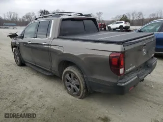 2020 Honda Ridgeline RTL-E with VIN 5FPYK3F73LB001983, listed as a Copart auction lot 44222325 with 86,782 mi miles and Salvage Title. Bid and sale history available at carsss.com. Image 2.