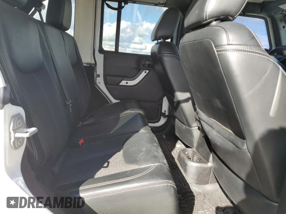 2015 Jeep Wrangler Unlimited Sahara with VIN 1C4BJWEG6FL614671, listed as a Copart auction lot 86052284 with 92,894 mi miles and Salvage title. Bid and sale history available at DreamBid. Image 11.
