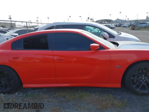 2020 Dodge Charger Scat Pack z VIN 2C3CDXGJ1LH221572, wystawiony jako IAAI lot #41286078 z przebiegiem 67 514 mil mil oraz . Historia ofert i sprzedaży dostępna na DreamBid. Obrazek 13.