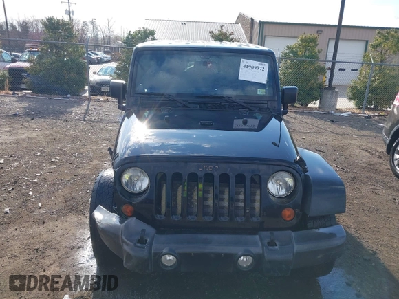 2013 Jeep Wrangler Unlimited Freedom z VIN 1C4BJWDG8DL648870, wystawiony jako IAAI lot #41909372 z przebiegiem 184 203 mil mil oraz . Historia ofert i sprzedaży dostępna na DreamBid. Obrazek 12.