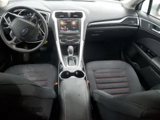 2016 Ford Fusion SE Hybrid z VIN 3FA6P0LUXGR350997, wystawiony jako Copart lot #62301825 z przebiegiem 267 537 mil mil oraz Szkoda całkowita • Salvage title. Historia ofert i sprzedaży dostępna na DreamBid. Obrazek 8.