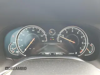 2016 BMW 7 Series 740i with VIN WBA7E2C52GG547112, listed as a Copart auction lot 63069355 with 76,867 mi miles and Salvage title. Bid and sale history available at DreamBid. Image 9.