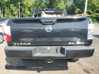 2017 Nissan Titan SV z VIN 1N6AA1E51HN571617, wystawiony jako Copart lot #71640544 z przebiegiem 89 088 mil mil oraz Szkoda całkowita • Salvage title. Historia ofert i sprzedaży dostępna na DreamBid. Obrazek 6.