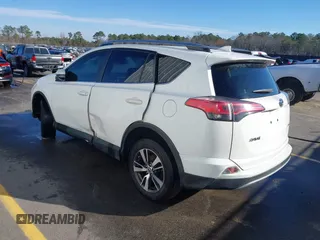 2018 Toyota RAV4 XLE with VIN JTMWFREV7JJ743297, listed as a IAAI auction lot 41579019 with 102,442 mi miles. Bid and sale history available at carsss.com. Image 3.