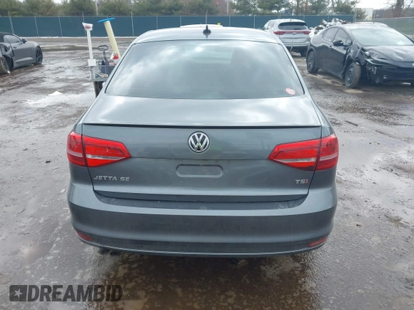 2015 Volkswagen Jetta Sedan 1.8T SE w/Connectivity with VIN 3VWD07AJ8FM260537, listed as a IAAI auction lot 41730338 with 155,724 mi miles. Bid and sale history available at carsss.com. Image 16.