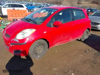 2009 Toyota Yaris with VIN JTDKT903495259976, listed as a IAAI auction lot 41670039 with 183,046 mi miles. Bid and sale history available at carsss.com. Image 2.
