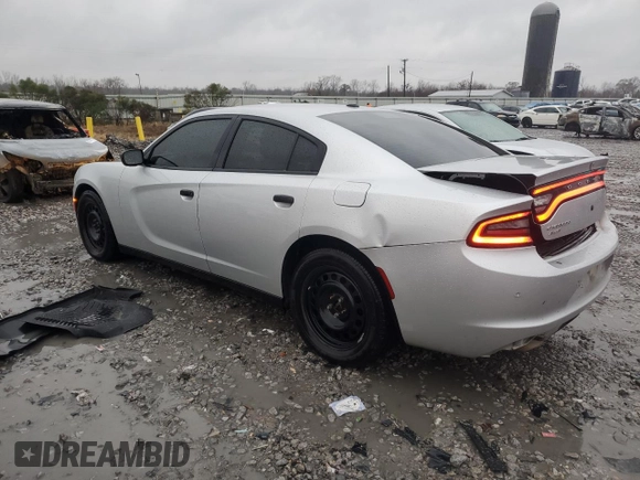 2018 Dodge Charger Police with VIN 2C3CDXKT0JH330370, listed as a Copart auction lot 87952225 with 141,104 mi miles and Salvage Title. Bid and sale history available at carsss.com. Image 2.